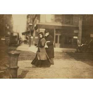  1912 child labor photo Woman carrying flowers home, W. Houston 