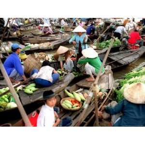  Small Wooden Boats Loaded with Fresh Produce Gather Along 
