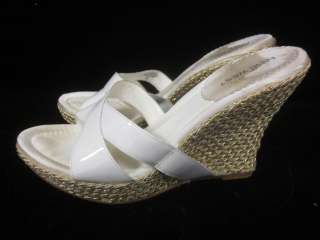 You are bidding on NINE WEST White Gold Patent Leather Wedges Heels 