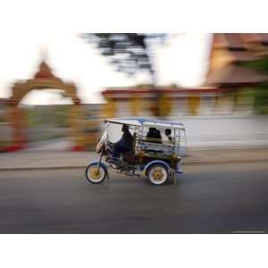 Tuk Tuk Racing Through Vientiane, Laos, Indochina, Southeast Asia 