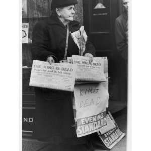 com A Woman Sells the Evening Standard Newspaper Announcing the Death 