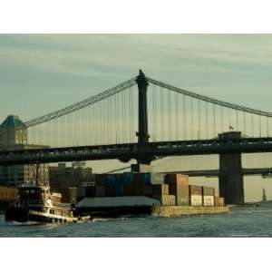  Tugboat Pulling a Barge on the East River Under the 