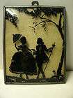 Vintage Glass Domed Silhouette Artwork of a Victorian Man and Women 