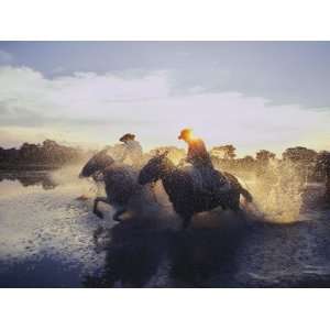  Argentine Gauchos Race across a Lake Near Beron De Astrada 