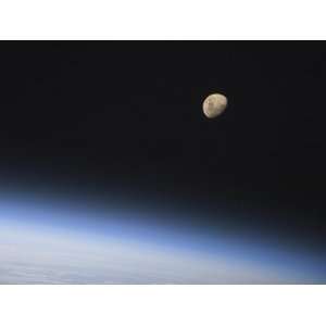 Gibbous Moon Visible Above Earths Atmosphere Premium Poster Print 