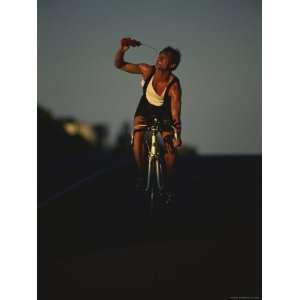  Cyclist Squirting Water Giclee Poster Print