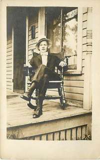 REAL PHOTO YOUNG MAN IN SUIT SITTING IN ROCKING CHAIR R52917  