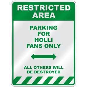   PARKING FOR HOLLI FANS ONLY  PARKING SIGN