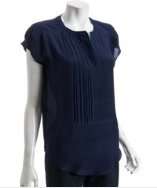 style #308107201 navy silk oversized pleated bib blouse