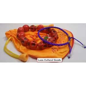 Luos (Set of 3) A 8.25 Red Skull bracelet, a Purple String Bracelet 