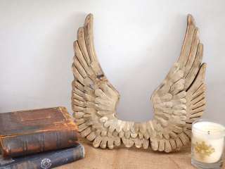 with these beautiful wings Made of wood and metal, these wings 