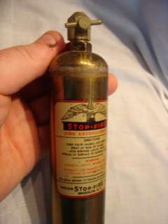   Brass Stop Fire Extinguisher with original bracket 