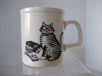 White Ceramic Coffee Mug with Black and White Striped Cat with Red 