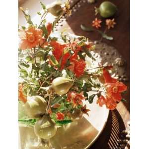  Pomegranate Flower and Fruit Arrangement on a Coffee Table 