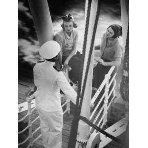  Sailor Talking To Two Women Standing at Railing on Cruiser Deck 