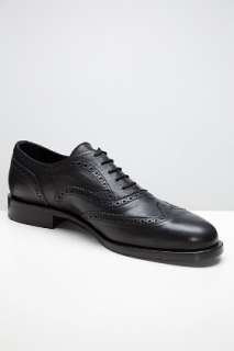 Common Projects Black Wingtip Slip on for men  