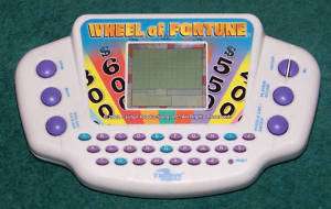 TIGER   POCKET WHEEL OF FORTUNE HANDHELD GAME  