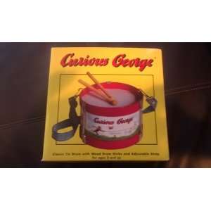   Curious George   Classic Tin Drum with Wood Drum Sticks Toys & Games