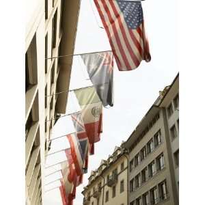  Row of International Flag Hanging from a Building 