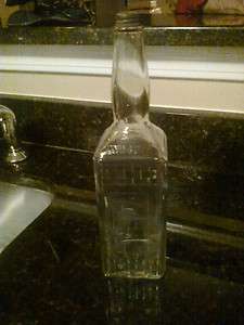 Vintage Lucky Tiger Bottle   Embossed   11 Tall  