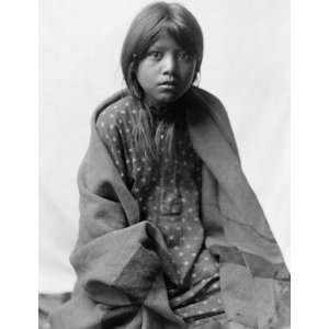 Taos girl, three quarter length portrait, seated, facing front A Taos 