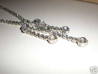 this is an older art deco 1950s vintage rhinestone lavalier necklace.