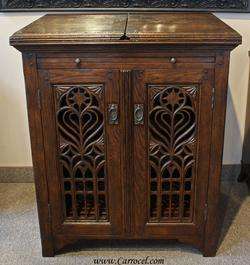 Oak Wine Cabinet with Hand Carved Gothic Motif  